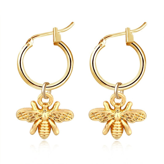 Gold hoop earrings with bee charm