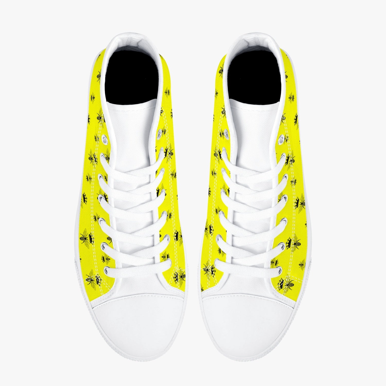 top view of high top canvas sneakers with yellow and black bee print and white outsole