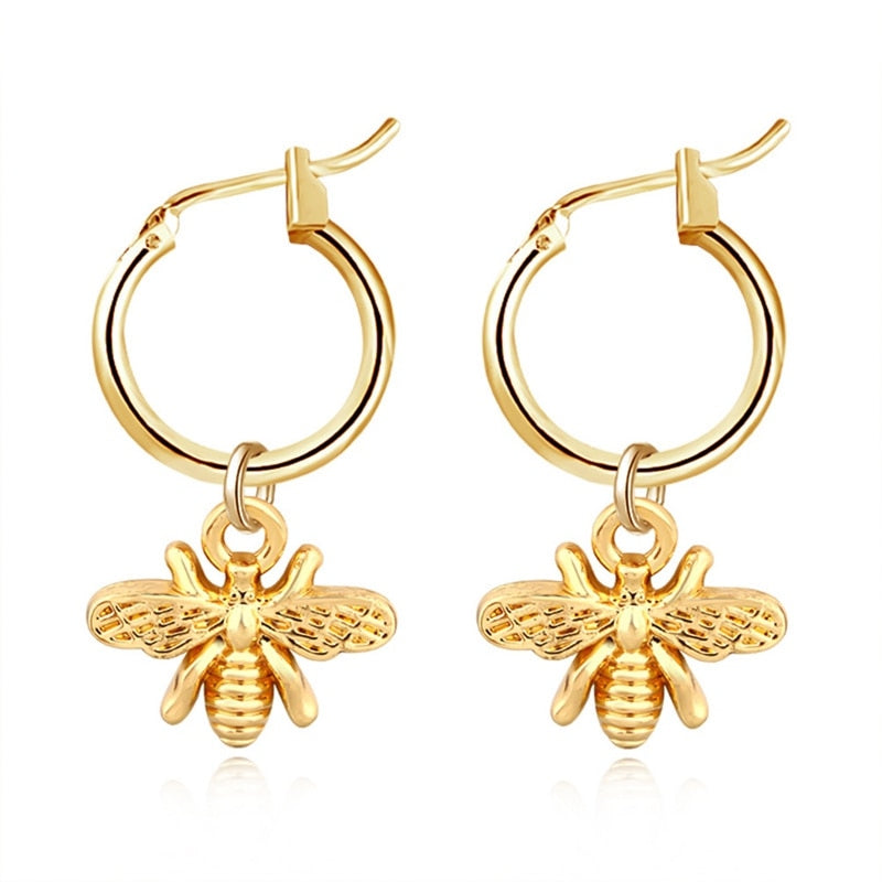 Gold hoop earrings with bee charm