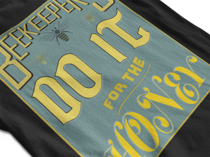 Close-up view of 'beekeepers do it for the honey' design